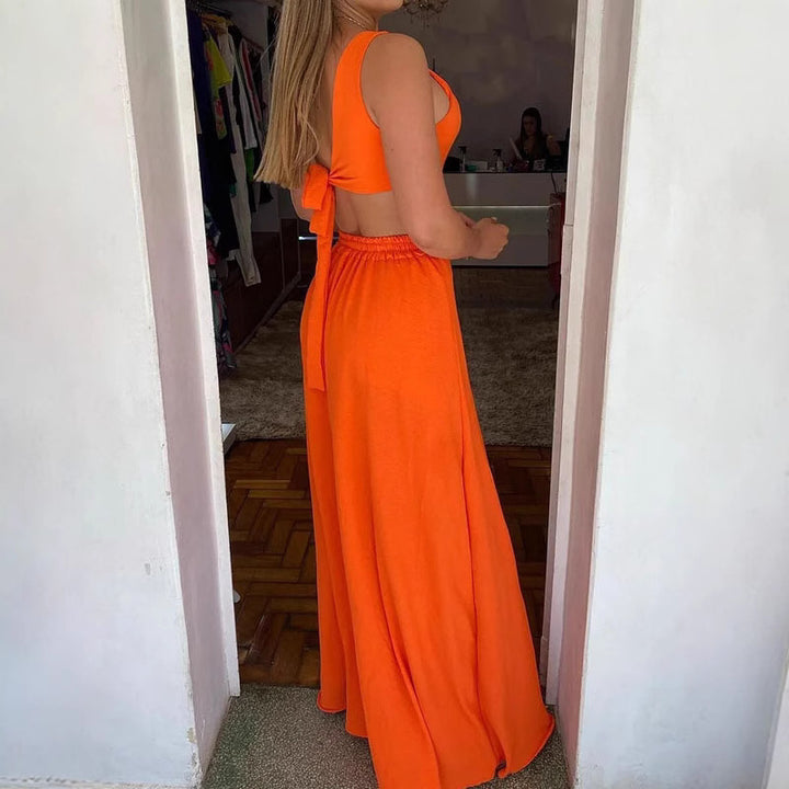 Dame Maxi-kjole med asymmetrisk udskæring og cut-out-detaljer Stilla