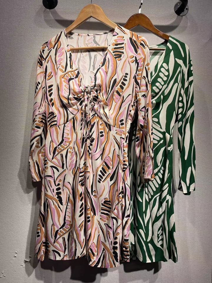 Dame Midikjole med raffineret knudedetalje og kreativt mønster Stilla