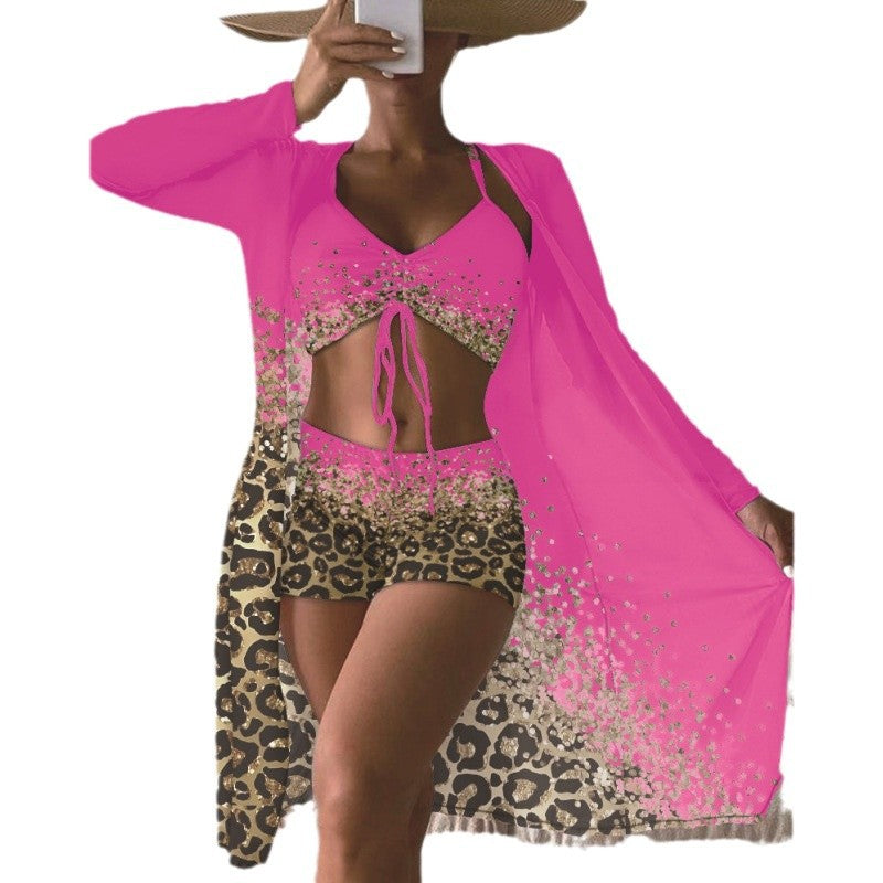 Dame strandoutfit med leopardmønster og farverigt cover-up Stilla