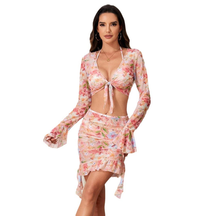 Damebluser-badeoutfit med farverigt blomsterdesign Skovae