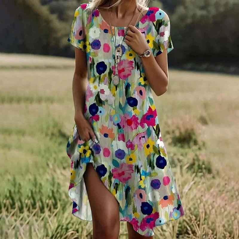 Dame sommerkjole med blomstret detalje og asymmetrisk kant Stilla