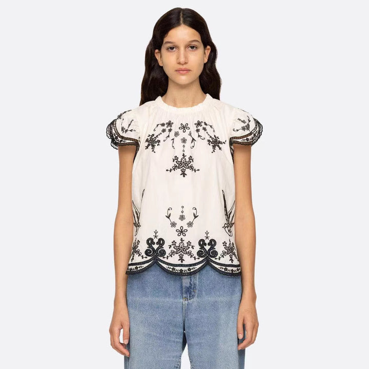 Dame elegant bluse med kunstneriske broderier og flæseærmer Stilla