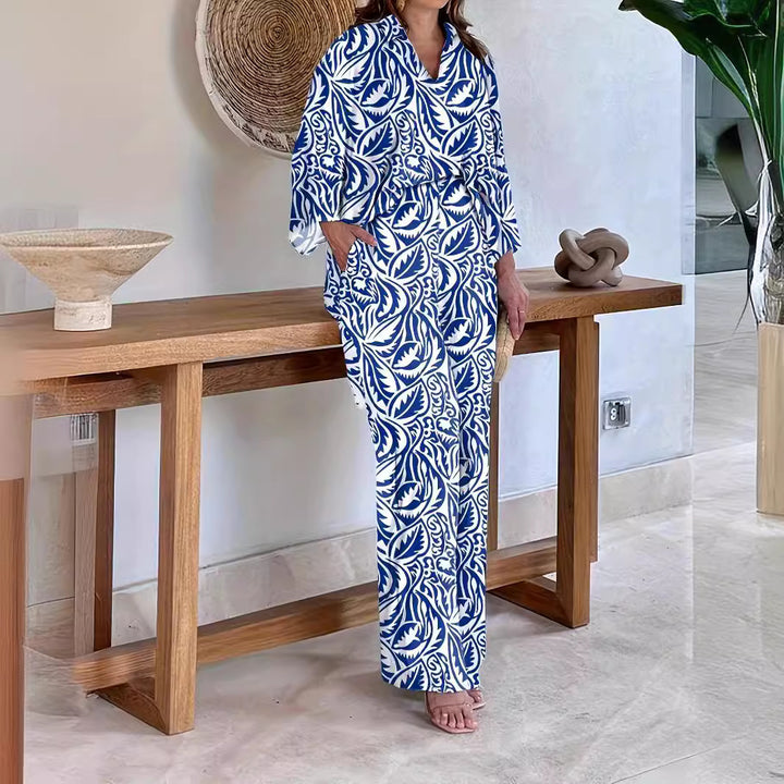 Dame Elegant og luftig strandkombination med florale mønstre Stilla
