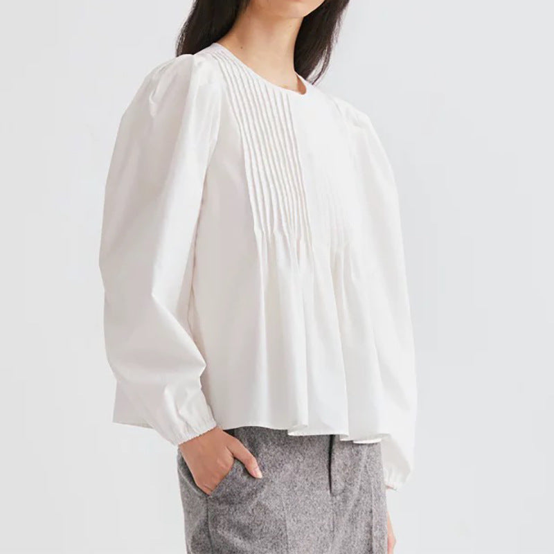 Damebluse med plisserede detaljer og voluminøse ærmer Stilla