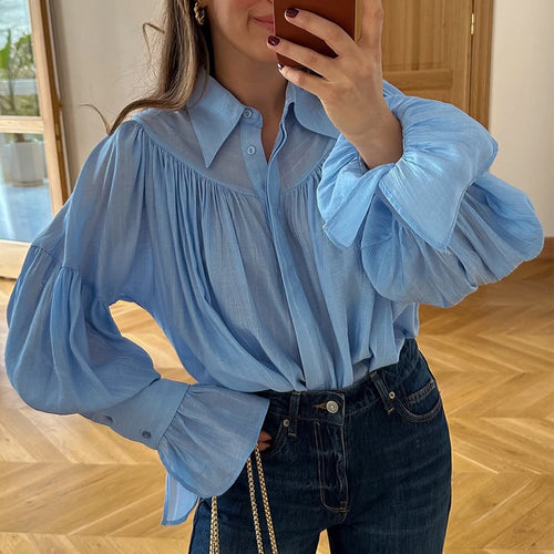 Dame oversized bluse med voluminøse ærmer og elegant knaplukning Stilla