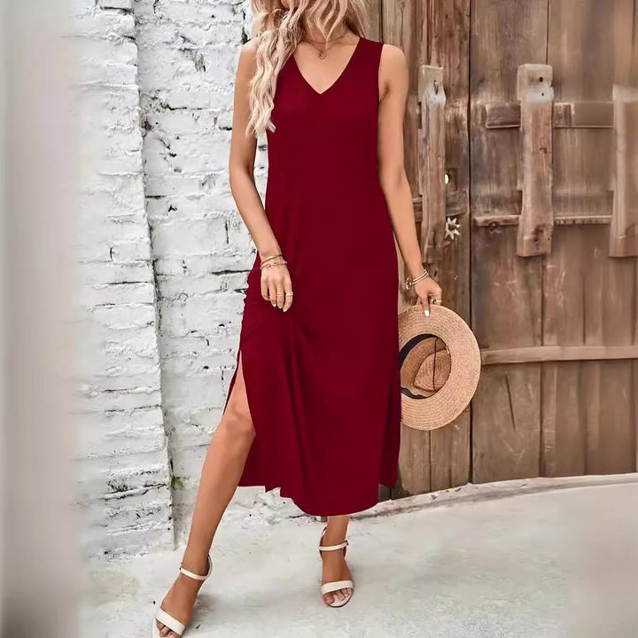 Dame afslappet V-hals maxi kjole med asymmetrisk kant og sidelæg Stilla