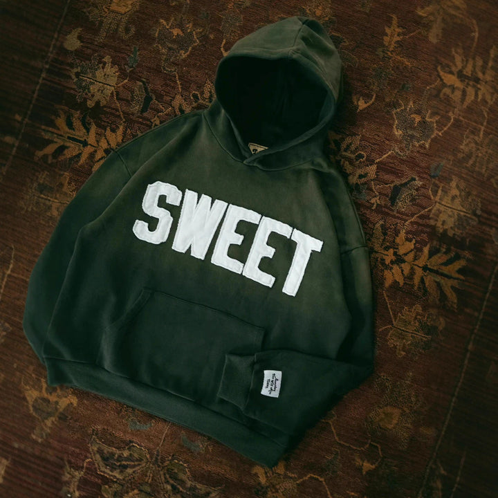 Unisex nan weit gesnit hoodies med påsyede bogstaver og kængurulomme Skovae