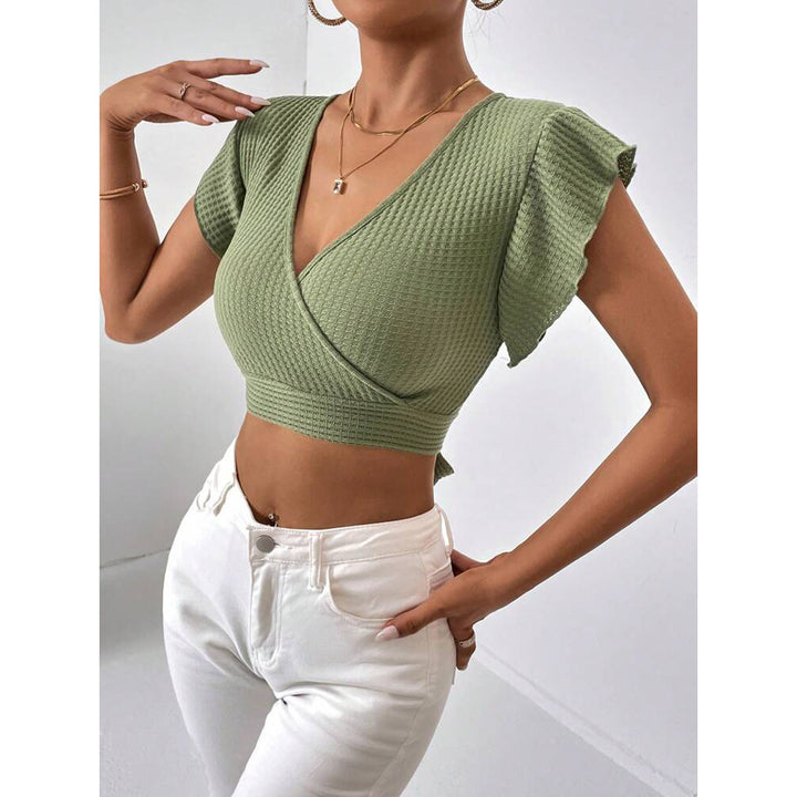 Dame Crop-top med indpakningsdesign og voluminøse ærmer Stilla