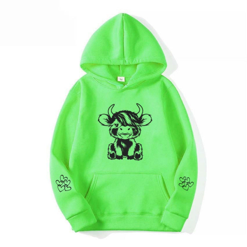 Kvindernes hætte sweatshirt med charmerende kvægmotiv og praktiske kængurulommer Skovae