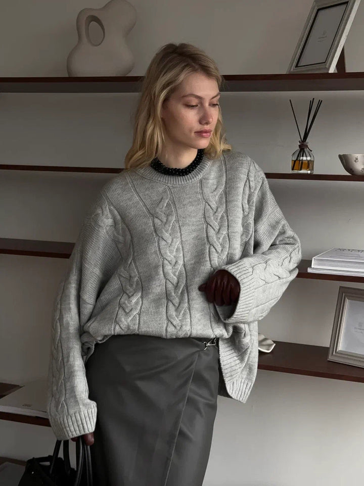 Kvinders strikkede sweater med kabelmønster og let vævning Stilla