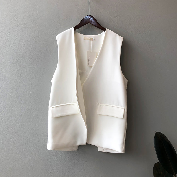 Dame elegant vest med dyb V-udskæring og praktiske lommer Stilla
