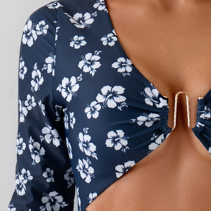 Dame én deler badedragt med floralt cut-out og dekorativ twist Stilla