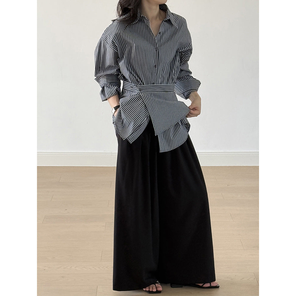 Damebluse med moderne omslagsdesign og elegante pufærmer Stilla