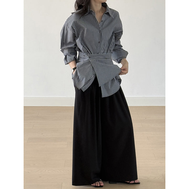 Damebluse med moderne omslagsdesign og elegante pufærmer Stilla