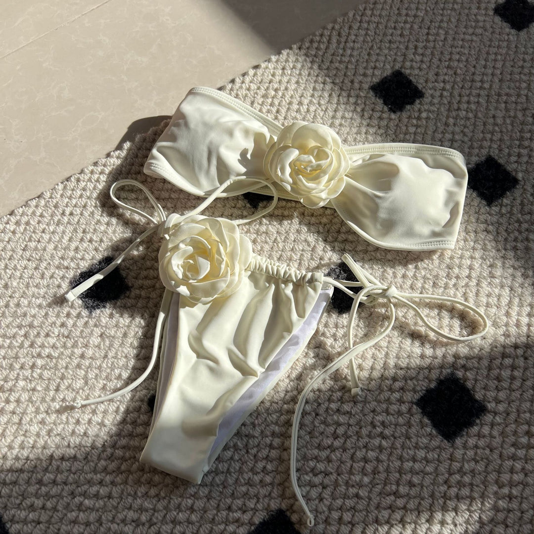 Dame bikini-sæt med elegante blomsterapplikationer Stilla
