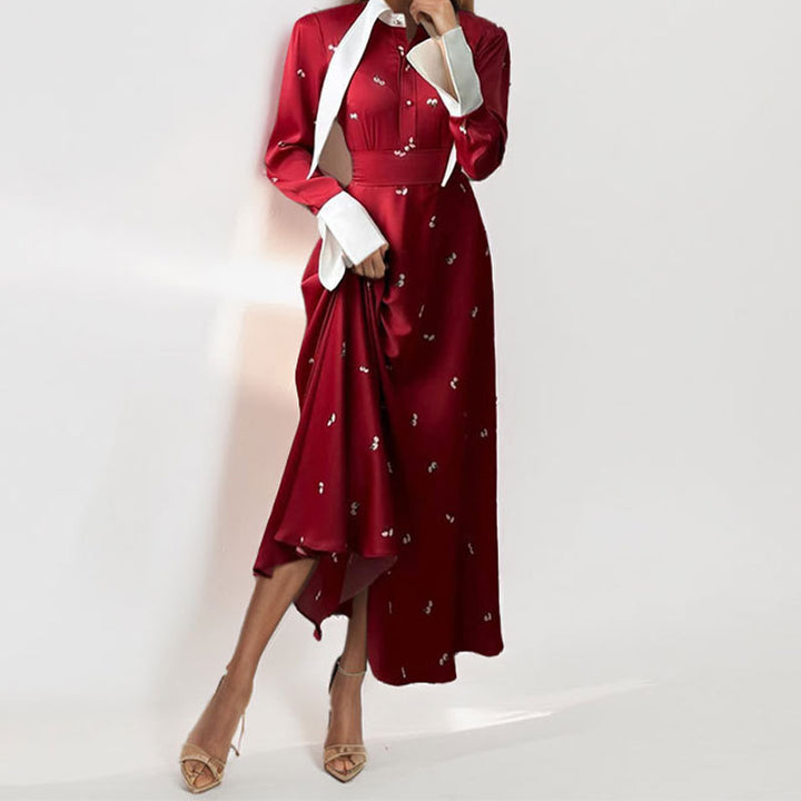 Kvinders elegante maxikjole med kunstnerisk drapering og lange ærmer Stilla