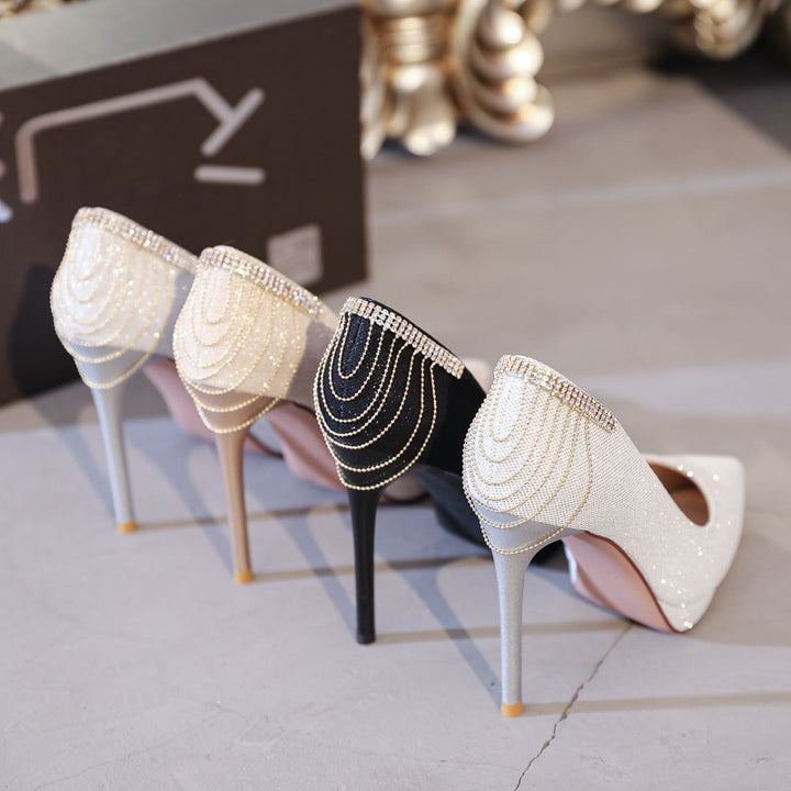 Dame nan elegante aftenpumps med fint glimmermesh, spids tåparti, filigran stilettohæl og dekorativ hæl-applikation Skovae