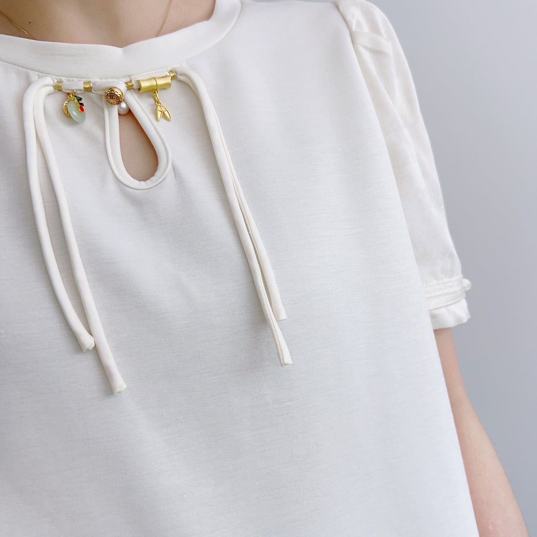 Dame Stilet T-shirt med elegant nøgleudskæring og puffærmer Stilla