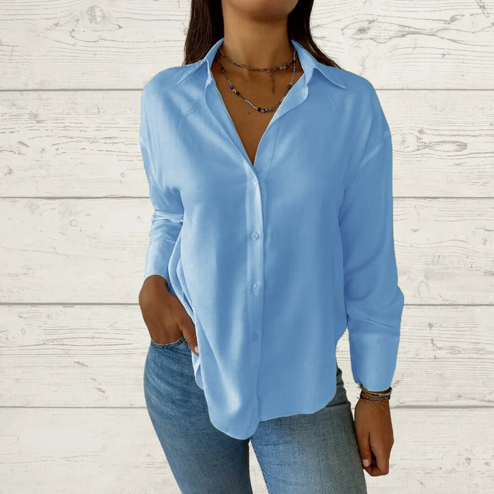 Dame moderne bluse med skinnende stof Stilla