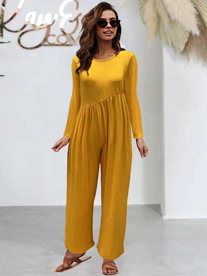 Dame mode jumpsuit med glitrende overdel og vidt skåret ben Stilla