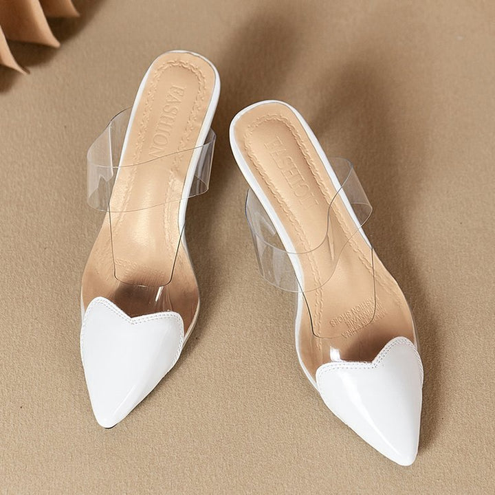 Dame transparente Mules med hjerteformet spids og modeaccent Stilla