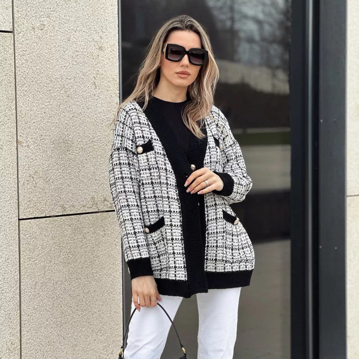 Kvinders bouclé cardigan med elegante knapdetaljer Stilla