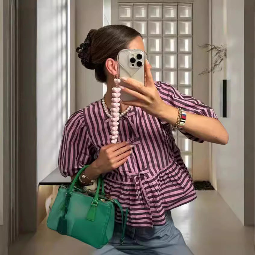 Kvinders fritidsbluse med moderne stripe mønster og afslappet snit