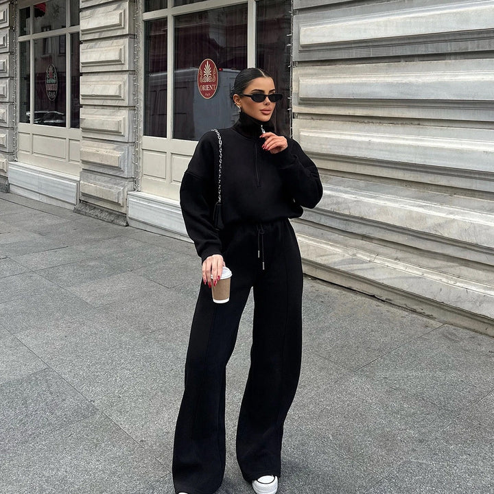 Dame behagelig Fleece-Athleisure-dragt med ståkrave og lynlås Stilla