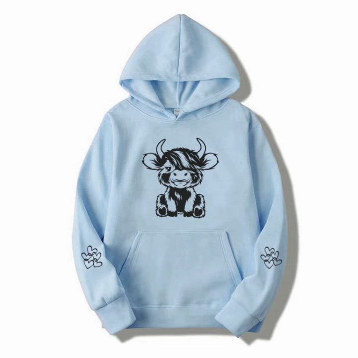 Kvindernes hætte sweatshirt med charmerende kvægmotiv og praktiske kængurulommer Skovae