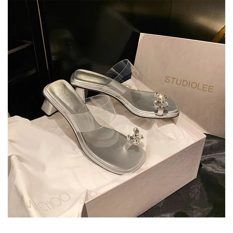 Dame transparente sandaletter med funklende blomsterakcent Stilla