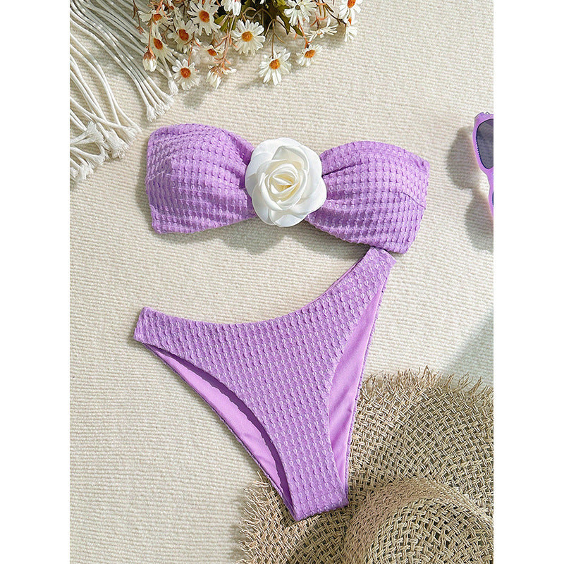 Dame bandeau-bikini med dekorative blomsterdetaljer og høj benudskæring Skovae