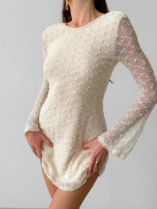 Dame minikjole med strukturerede detaljer og elegante lange ærmer Stilla