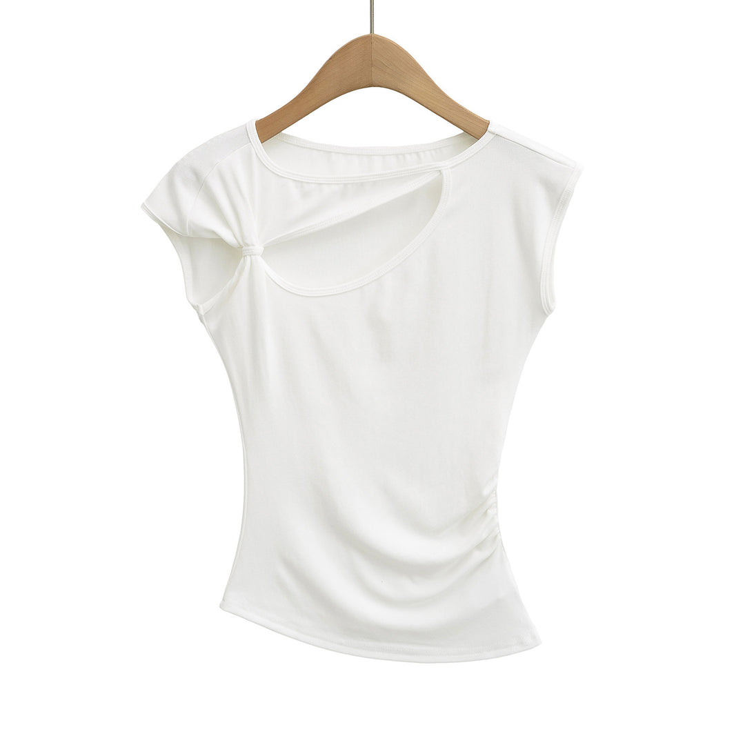 Dame sportslig top med asymmetrisk snit og modige cut-out-detaljer Stilla