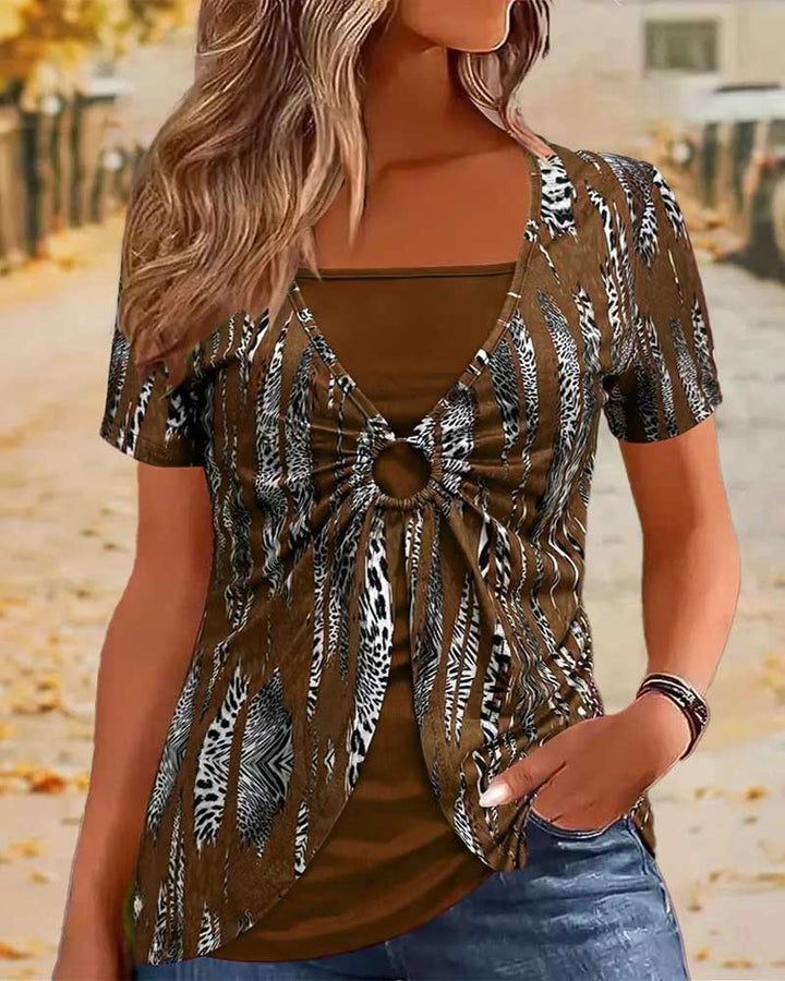 Dame Let top med mode ringdetalje Stilla