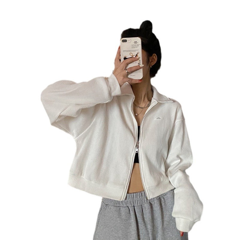 Dame cropped fleece jakke med moderne lynlås og afslappede ærmer