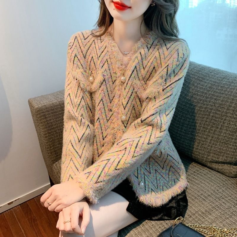 Kvinders fashionable cardigan med chic zigzag mønster og elegante knapdetaljer Stilla