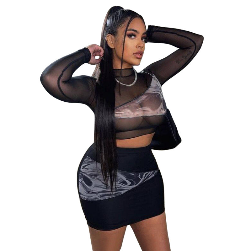 Dame sæt bestående af transparent bluse og figursmigrende mini nederdel med leopardmønster Stilla