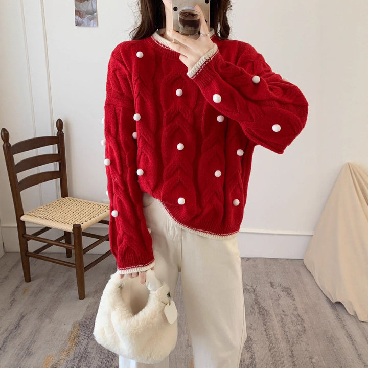 Kvindernes strikkede sweater med dobbelt kabelstruktur og dekorative pomponer Stilla