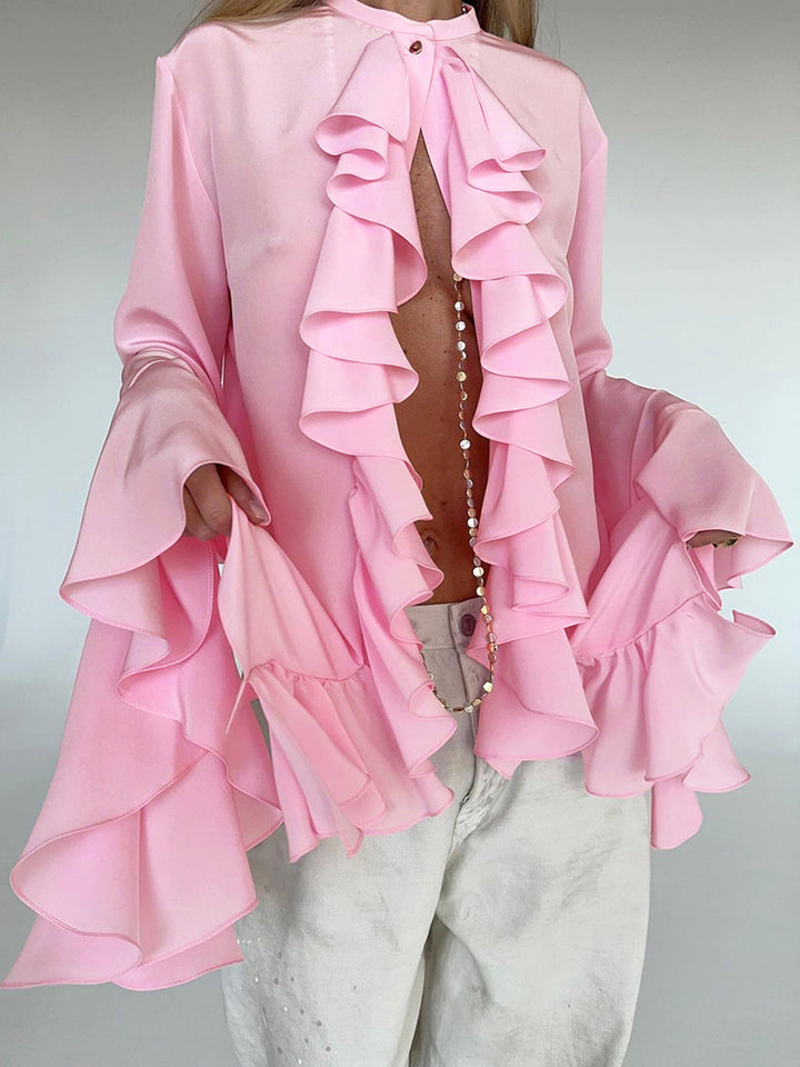 Damebluse med voluminøse flæser og elegante trompetærmer Stilla