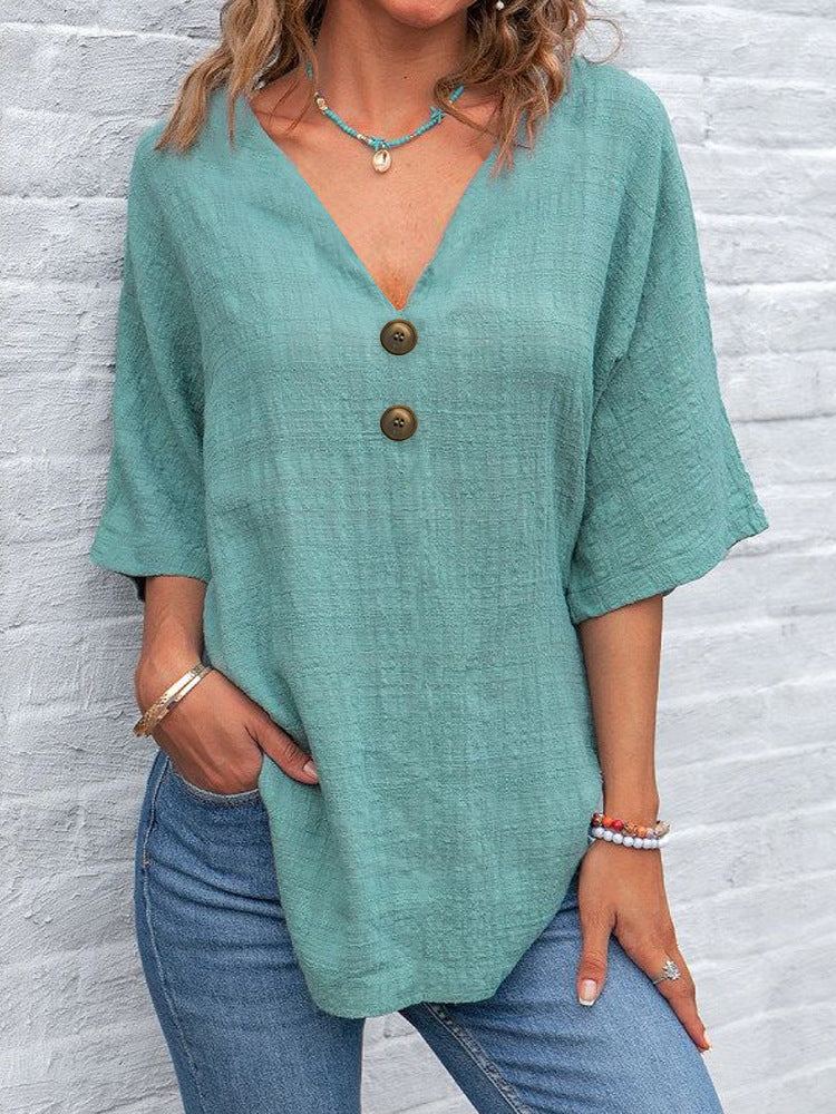 Dame V-hals bluse med knapdetaljer Skovae