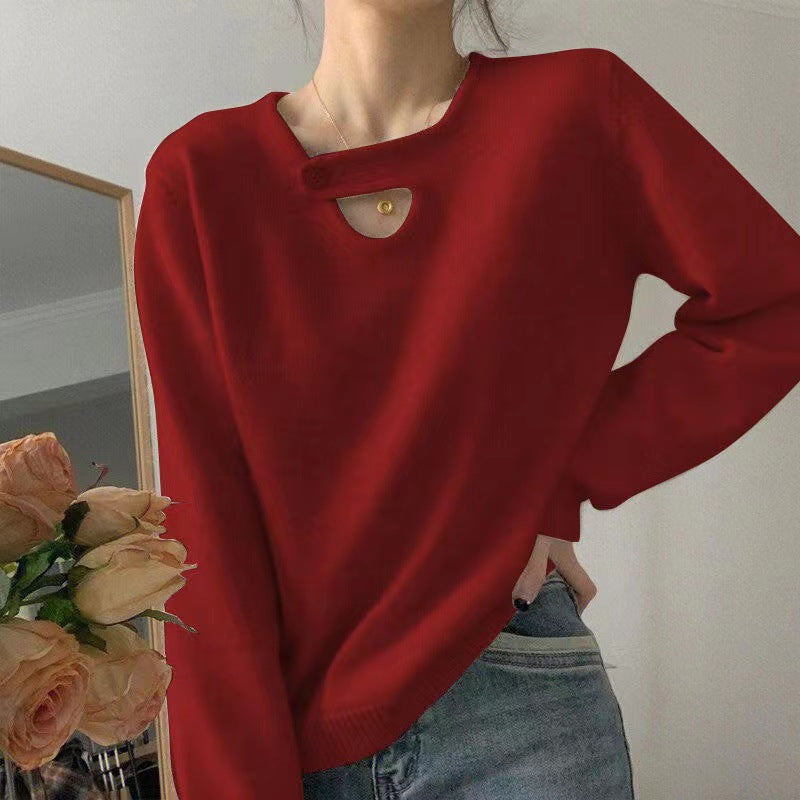 Kvindesweater med innovativ knapdetalje og afslappet skæring Stilla