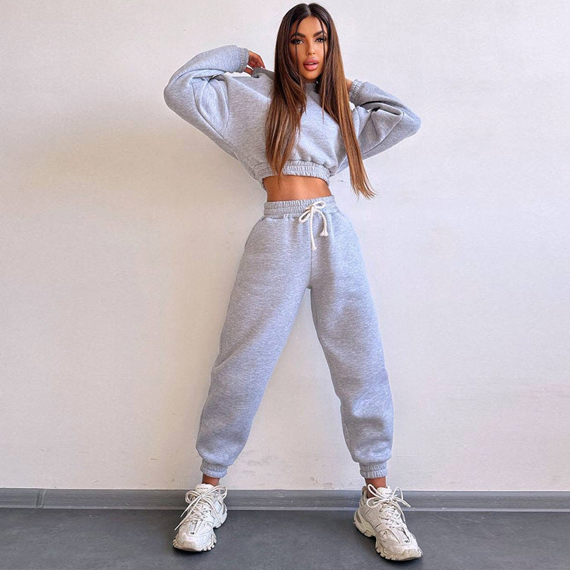 Kvinders sporty cropped sweat sæt med elastisk talje og praktiske lommer