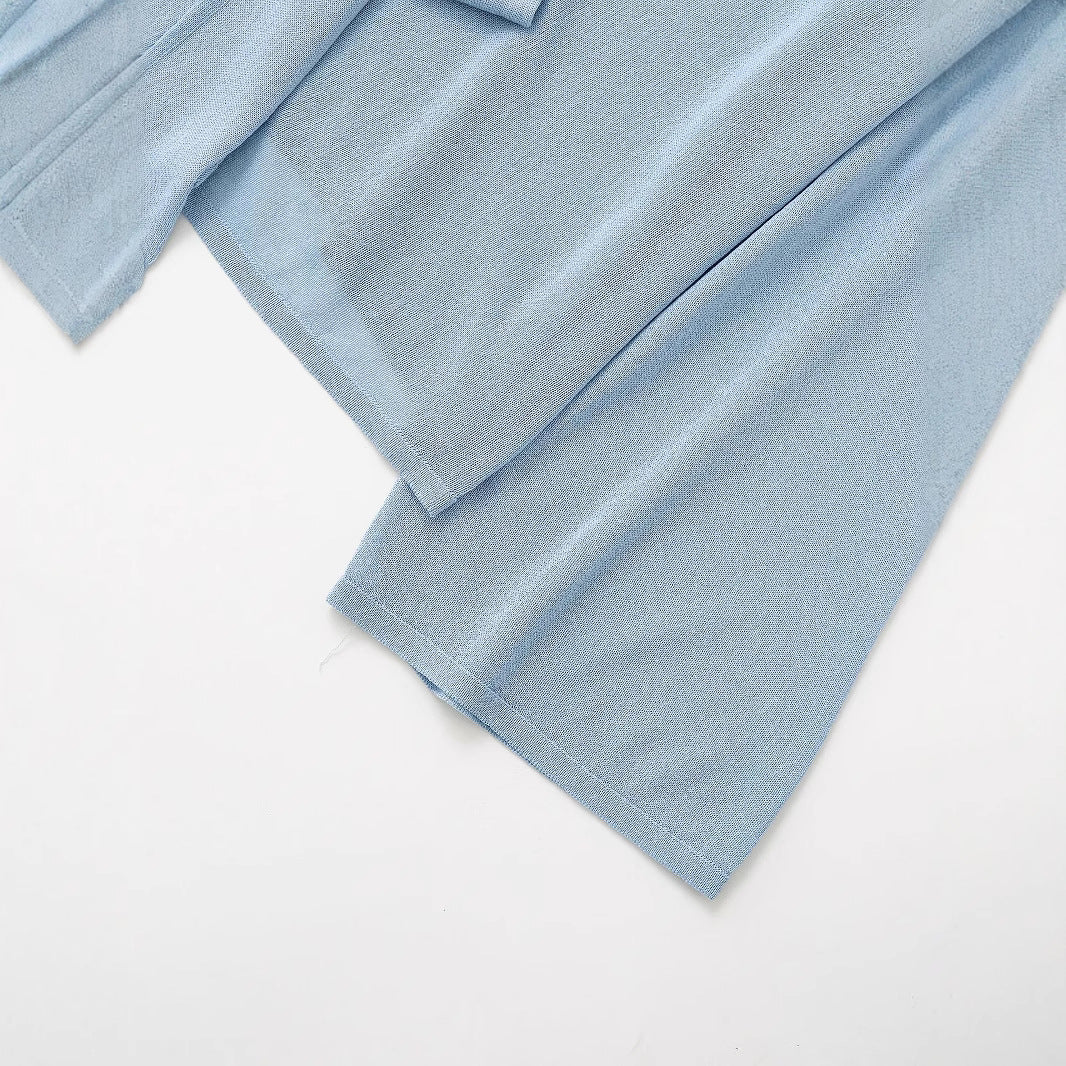 Kvinders luftbluse med romantiske ruffle-detaljer og bindebånd Stilla