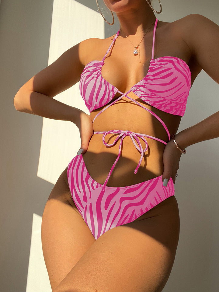 Dame bikini-sæt med moderne knude-design og trendy zebrastribet mønster Stilla