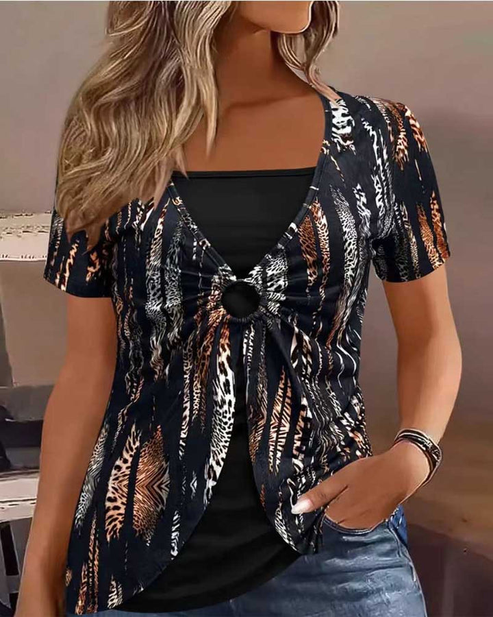 Dame Let top med mode ringdetalje Stilla
