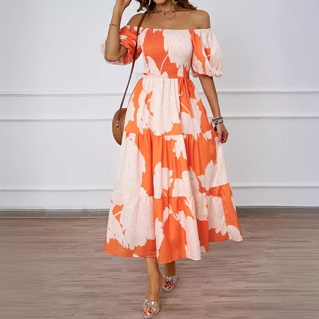 Dame maxikjole i afslappet off-shoulder design med voluminøse ærmer og blomsterprint Stilla
