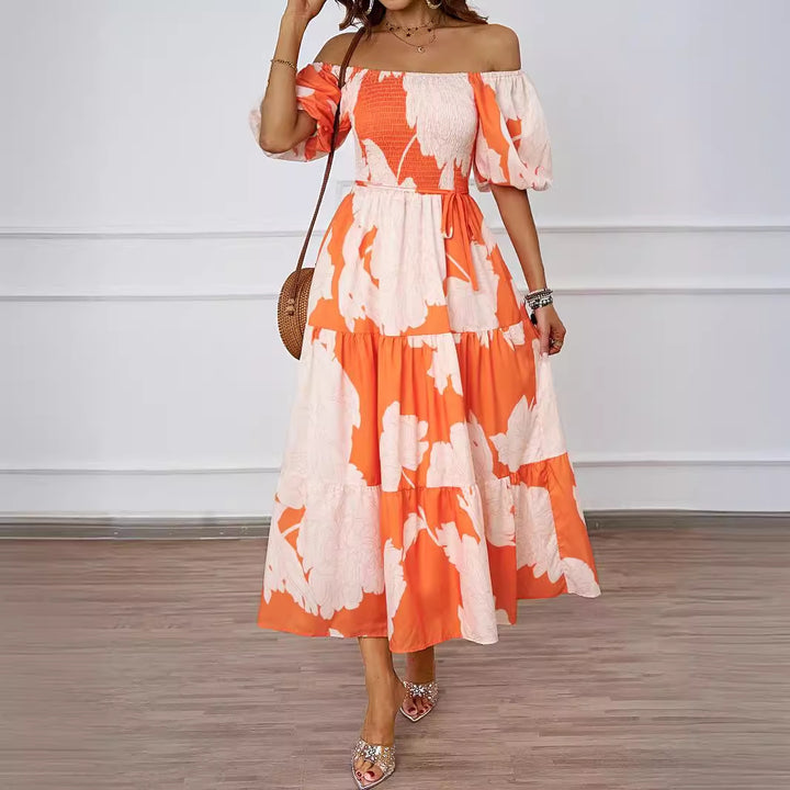 Dame maxikjole i afslappet off-shoulder design med voluminøse ærmer og blomsterprint Stilla