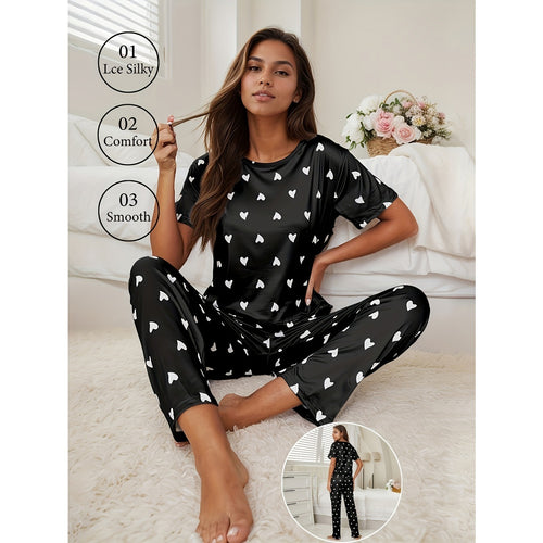 Dame pyjamasæt med blødt materiale og legeligt hjerte design Stilla