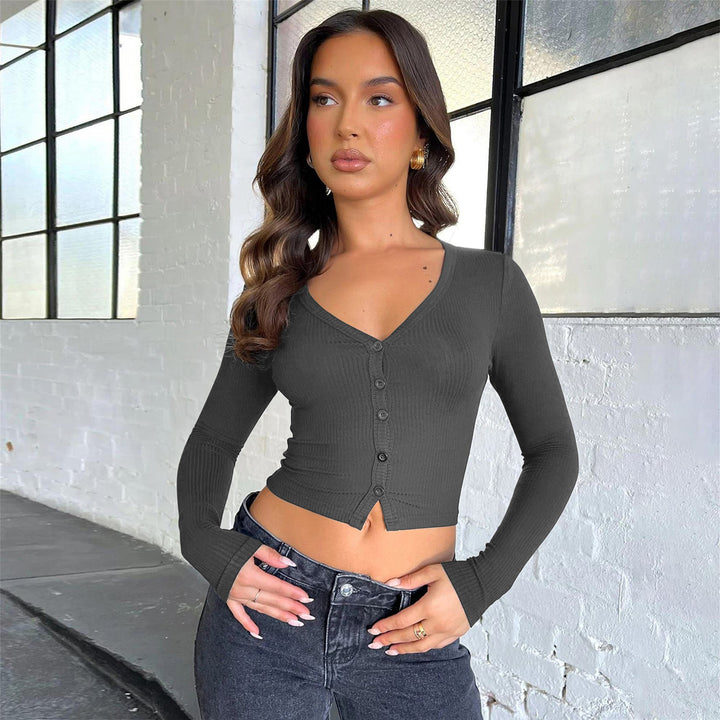 Dame ribstrik bluse med knapliste og figursyet snit Stilla