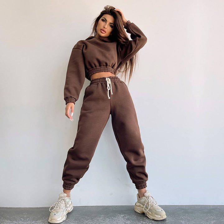 Kvinders sporty cropped sweat sæt med elastisk talje og praktiske lommer